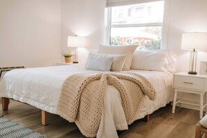 King bed with luxury sheets in both of (2) bedrooms. 