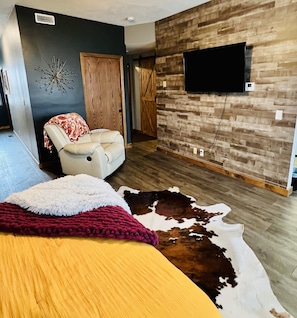 Comfy recliner and floor cushions to watch any streaming service you’d like.
