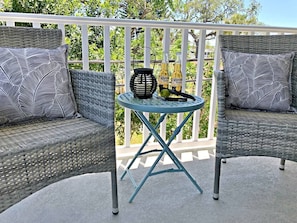 Enjoy a treetop patio then walk downtown