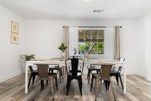 This unique dining table extends to accommodate a big meal for everyone. 