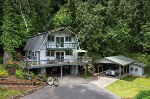 Carport for you, and a great deck for grilling and watching the river.