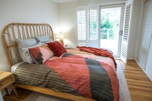 King bedroom opens out to back deck