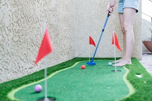 Casa Saguaro is close to many golf courses--or, just stay home and perfect your put in the backyard at Casa Saguaro