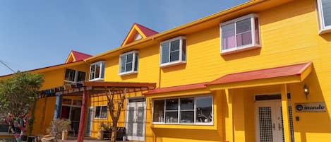 Red roof and yellow wall are landmarks