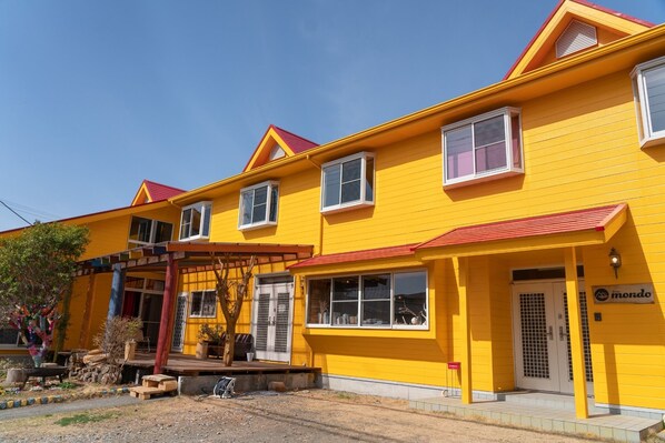 Red roof and yellow wall are landmarks