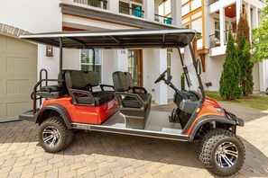Complimentary 6-seat street legal golf cart