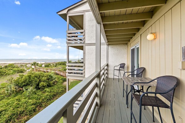 The spacious balcony with ocean views