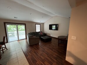 Floor, Flooring, Furniture, Indoors, Living Room