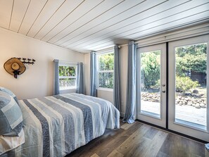 Master bedroom with views over the backyard