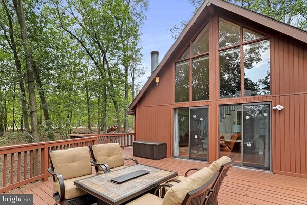 "Embracing tranquility on the retreat's serene back deck."