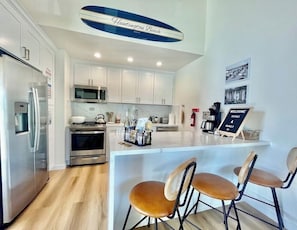 Open layout kitchen perfect for preparing a family meal together.