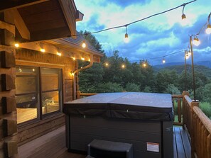 Master Spa hot tub right on the deck. Complete privacy as this deck backs up to the woods.