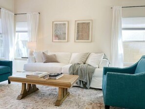 Inviting living room as soon as you walk through the door! Perfect for convos