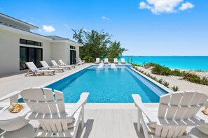 Beachfront deck with multiple seating areas