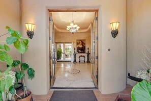 Entryway | High Ceilings | Exposed Brick | Gas Fireplace