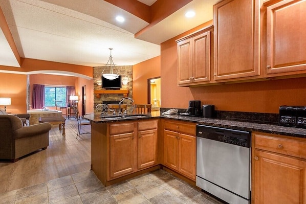 Upscale throughout, granite counter tops, stainless steel appliances.
