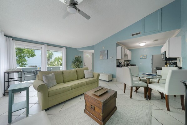 Spacious living room with sleeper sofa. 