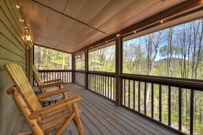 Screened porch where you can enjoy the view of the GA Mountains