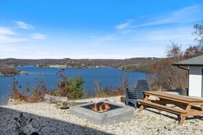 Beautiful views overlooking the lake from nearly every angle, including the firepit area!