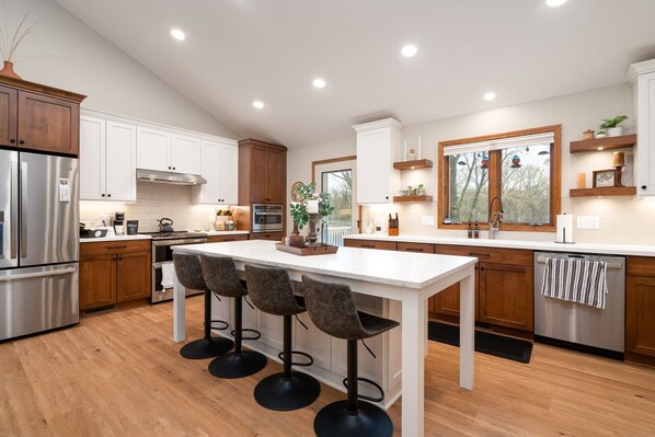 Bar seating at the kitchen island. You'll love cooking here!