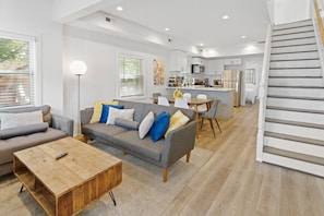 Spacious living room, dining area and kitchen