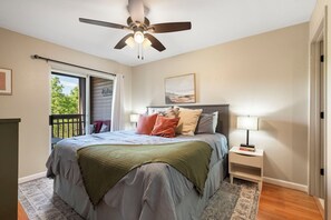 Master bedroom with king bed and en suite