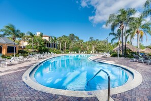 - Shared Pool Area of the Resort in Davenport Florida - Unwind and Delight in the Sparkling Waters of the Bahama Bay Resort Pool - Relax by the shimmering poolside oasis