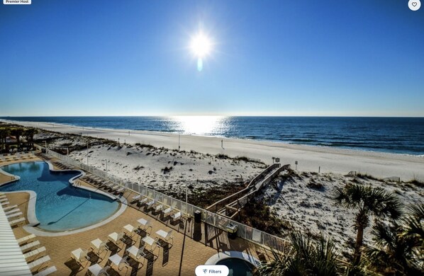 This shows the beauty  of the pool, beach, and Gulf at Ocean House.
