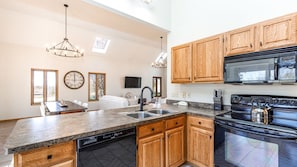The cook will never miss a thing with this open-concept kitchen