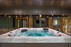 PRIVATE COVERED PATIO WITH HOT TUB AND FIRE PIT