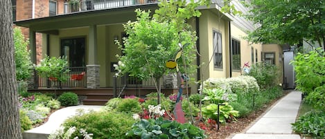 Lighted walkway on the right leads to the studio entrance in back of our home.