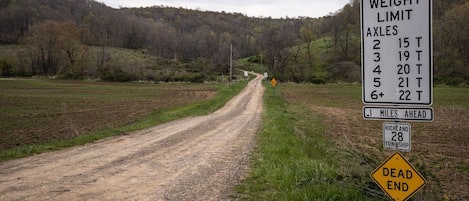 This is the road you will turn onto that the cabin is located on. It is dirt all the way up to the cabin. This is taken from the state road, about 1/2 mile away!