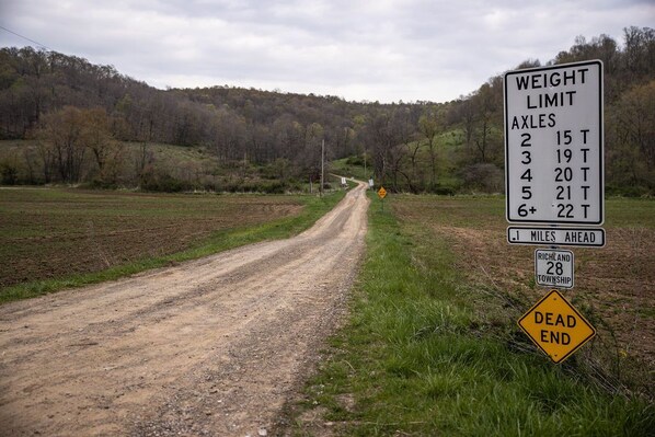 This is the road you will turn onto that the cabin is located on. It is dirt all the way up to the cabin. This is taken from the state road, about 1/2 mile away!