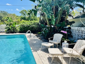 Outdoors sitting area by the pool