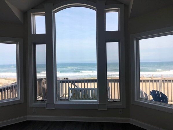 Incredible ocean view from open living room, dining area, and kitchen.