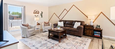 Watch TV or a DVD, play board games or just relax in this comfy living room