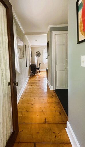 Entrance from the sunroom into the bedroom and bathroom areas.