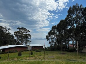 Fenced dog yard with view 