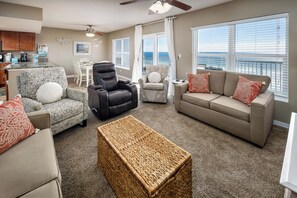 Living Room - Just steps away from your private balcony!