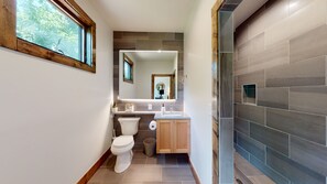 Private en suite bathroom for bedroom 3! Large walk in tile shower!