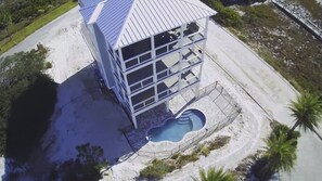 Pool and outdoor shower with direct beach boardwalk access from pool area