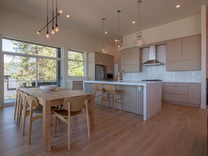 Gorgeous modern gourmet kitchen with 12ft ceilings, butler pantry, wine fridge