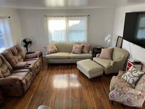 Furniture, Indoors, Living Room, Couch, Hardwood