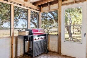 Screened in porch is a fun place to hangout on a summer night.