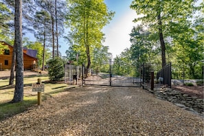 Gated entry to completely fenced private property 