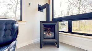 Catch up around the cozy fireplace