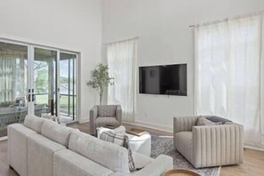 Luxurious living room with seating for 6 with additional seating if needed