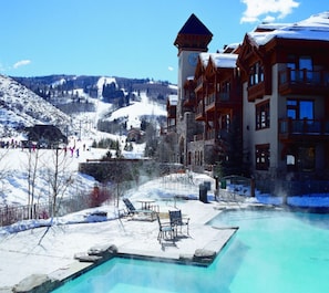 Your pool and hot tubs with a view of the chairlift and mountain! 