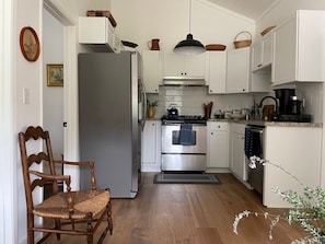 This fully equipped kitchen is set up for a simple or elaborate meal.