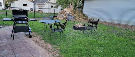 Lots of wood for the fire pit!
New gas grill for your backyard BBQ and cook outs